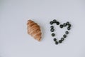 Valentine`s Day. Blueberry heart. Beautiful heart made of berries. Heart on a white background. Morning breakfast for valentine`s