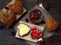 Valentine`s Day breakfast. Composition of wholegrain muffins in the form of heart with butter, cheese and jam.