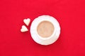 Valentine`s day coffee cup with two heart shaped white chocolate Royalty Free Stock Photo