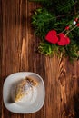 Cheesecake on Valentine`s Day with strawberry, kiwi hearts on fir and wood background