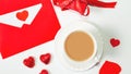 Valentine`s day composition with coffee cup and box of chocolate hearts and envelope with blank note mockup inside on white Royalty Free Stock Photo