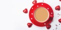 Valentine`s day composition with coffee cup and box of chocolate hearts on white background. Space for text. Royalty Free Stock Photo