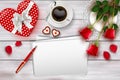 Valentine`s day composition on wooden table with heart shape objects and red roses Royalty Free Stock Photo