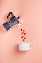 Valentine`s day concept with coffee maker pouring hearts into a cup