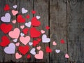 Valentine`s Day concept. Composition of paper colourful hearts on wooden background. Royalty Free Stock Photo