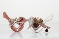 Valentine`s day concept. Couple in love, just married or honeymoon concept. Couple of wooden birds looking at each other