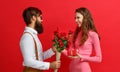 Valentine`s day concept. happy young couple with heart, flowers Royalty Free Stock Photo