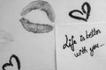 Valentine`s day concept. Lipstick kiss. Writing and drawing with lipstick. Life is better with you