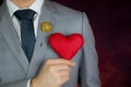 Valentine's day concept, man carries red heart Royalty Free Stock Photo