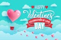 Valentine`s day concept. Paper art of heart balloon flying and scattering little heart in the sky, origami. Design for Invitation Royalty Free Stock Photo