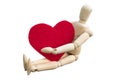 Valentine`s day concept. Wooden dummy hug a heart shape that made from acrylic felt fabric Royalty Free Stock Photo