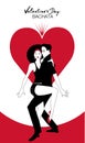 Valentine`s Day. Couple dancing bachata on heart in the background