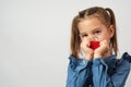 Valentine's day. Cute little child girl holding red heart Royalty Free Stock Photo