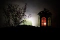 Valentine`s day decor concept. Romantic scene. Big Lantern as lovers house with rising moon on night decor background. Selective f