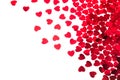 Valentine`s day decorative border of red hearts confetti isolated on white background. Royalty Free Stock Photo