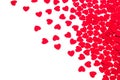 Valentine`s day decorative border of red hearts confetti isolated on white background. Royalty Free Stock Photo