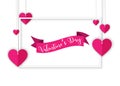 Valentine`s Day design with hanging pink hearts paper cut style in white frame Royalty Free Stock Photo