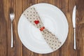 Valentine's day dinner setting, Knife, fork, napkin and plate