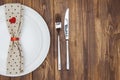 Valentine's day dinner setting, Knife, fork, napkin and plate Royalty Free Stock Photo