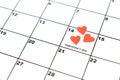 Valentine`s day, February 14, on the calendar with red hearts