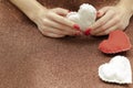 Valentine`s Day, February 14th. Red and white hearts. Fire candles. Red manicure. Frame. Background. Light, brilliant. Hearts mad Royalty Free Stock Photo