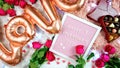 Valentine`s Day flat lay with roses, chocolates and letterboard. Royalty Free Stock Photo