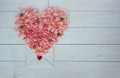 Valentine`s day. Flowers and love letter on wooden background. Retro style.