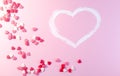 Valentine`s Day. Frame made of gifts, candles, confetti on pink background. Valentines day background. Flat lay, top view, copy sp