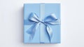 Valentine\'s Day Gift: Blue Gift Box With Bow On White Background