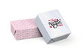 Valentine`s day gift - cardboard wrapped in paper with valentine theme on white background - 3d - copy space