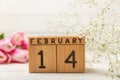 Valentine\'s Day gift. Wooden calendar with the date February 14.