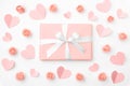 Valentine`s day greeting card with heart, coral or pink flowers and gift box isolated on white background. Top view. Flat lay Royalty Free Stock Photo