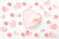 Valentine`s day greeting card with heart coral or pink flowers and heart shape gift box isolated on white background. Top view. Royalty Free Stock Photo