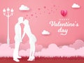 Valentine`s Day greeting card. romantic couple kissing and holding hands on pink background Royalty Free Stock Photo