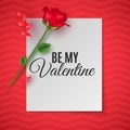 Valentine`s Day greeting card. Top view. Romantic composition. Paper note with the inscription Be My Valentine and rose flower. Royalty Free Stock Photo