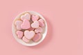 Valentine\'s Day heart shaped pink glazed cookies