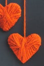 Valentine`s Day Hearts on a black background Homemade heart made of threads Royalty Free Stock Photo