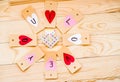 Valentine`s day holiday. hand made paper hearts labels on rustic background in circle Royalty Free Stock Photo