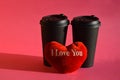 Valentine\'s day. holiday of lovers, love. viva magenta. background for the design. a heart and two drinks glasses.