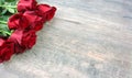 Valentine`s Day Red Roses Over Wooden Background Royalty Free Stock Photo