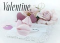 Valentine`s Day image of brightly exposed pink silk roses, cute fortune cookies made of felt and wooden hearts with lace, Royalty Free Stock Photo