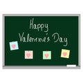 Valentine`s Day greeting and valentine stickers on the chalkboard