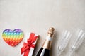 Valentine`s Day LGBT heart and champagne and gift box with red bow. Valentine`s Day concept
