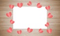 Valentines day love letter card with hearts on wooden background. Royalty Free Stock Photo