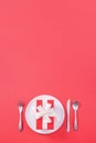 Valentine`s Day meal design concept - Romantic plate dish set isolated on red background for restaurant, holiday celebration Royalty Free Stock Photo
