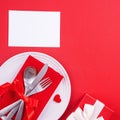 Valentine`s Day meal design concept - Romantic plate dish set isolated on red background for restaurant, holiday celebration Royalty Free Stock Photo