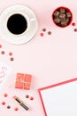 Valentine`s Day mock up with coffee drink, giftbox, candies on pastel pink background, flat lay Royalty Free Stock Photo