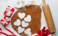 8 march, Valentine`s day, mother`s day baking culinary background, cooking recipe. gingerbread cookies on kitchen table Royalty Free Stock Photo