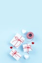 Valentine`s Day, Mother`s day handmade gift design concept - Wrapped gift box isolated on pastel light blue color background, fl