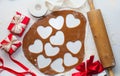 8 march, Valentine`s day, mother`s day baking culinary background, cooking recipe. gingerbread cookies on kitchen table Royalty Free Stock Photo